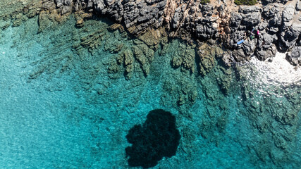 panoramic drone view of coastal sea water and rocky shore near Crete island