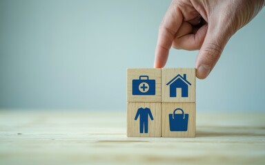 Wooden blocks with icons for medical, home, clothing, and shopping services