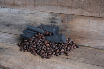 Coffee beans on a wooden background