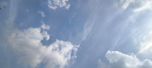 Sky is blue and clear with no clouds. The sky is very bright and the sun is shining. Blue sky with...