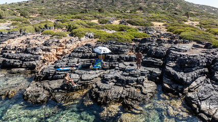 panoramic drone view of coastal sea water and rocky shore near Crete island