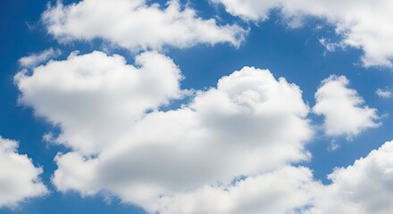 Vibrant blue sky filled with fluffy white cumulus clouds creating a serene and airy atmosphere, perfect for summer visuals