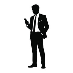 Obraz premium Silhouette of a businessman in a suit checking his smartphone