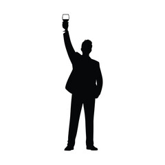 Silhouette of a man in a suit raising a glass in celebration