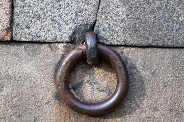 Iron ring in a granite wall.