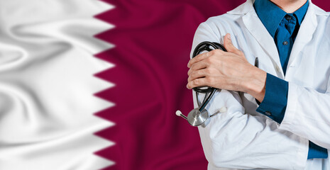 Doctor with stethoscope on Qatar flag. Doctor holding stethoscope on Qatar flag