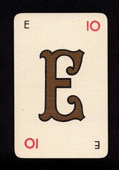A decorative playing card featuring a letter from the English alphabet isolated on a black background.