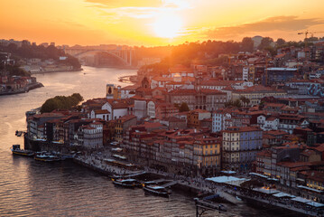 Sunset View of Porto with Dom Luis I Bridge and Douro River in Portugal