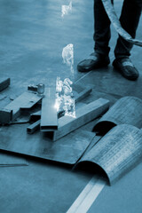 Person cleaning metal surface from rust with laser Laser cleaning metal surfaces