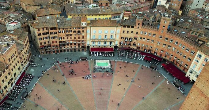 Elevated aerial perspective showcasing iconic Piazza del Campo in Siena, Tuscany