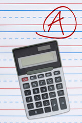 Getting a great grade with A mark on ruled loose leaf notebook paper and calculator