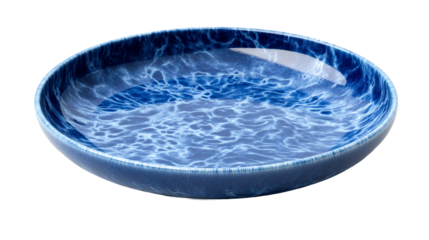 Deep blue ceramic plate with water pattern on clear background