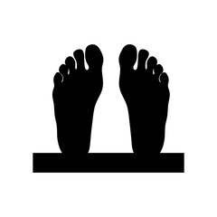 A pair of feet isolated on white background in silhouette form