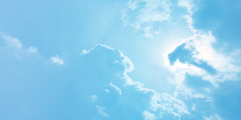 Storm clouds in the sky, Dramatic rain, Bright Flash shining light for design concept, panoramic view of clear blue sky and clouds, pastel white fluffy clouds