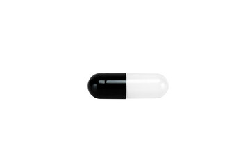 Black and white medicine capsule pill. A minimalist icon for healthcare, pharmacy, or treatment concepts. isolated on white background with clipping path.