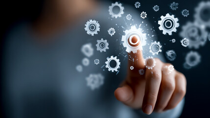 A business woman is touching a virtual screen with gears and icons representing business growth