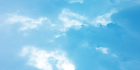 Storm clouds in the sky, Dramatic rain, Bright Flash shining light for design concept, panoramic view of clear blue sky and clouds, pastel white fluffy clouds