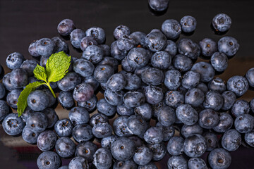 Macro photography of blueberries with water droplets