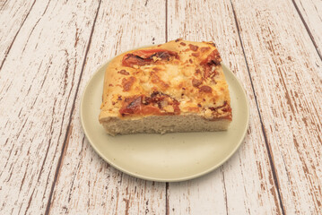 Although not pizza itself, focaccia is its closest relative. It's a baked flatbread