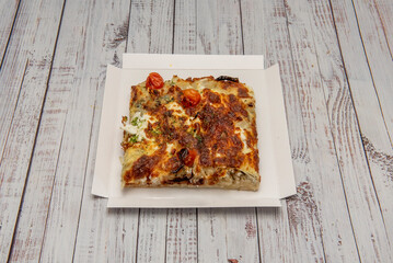 focaccia is its own entity, with a millennia-long history and a distinctive rustic charm.