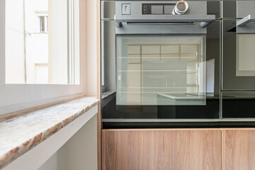 Modern kitchen with rustic touches: distressed wood, natural wood accents, and a sleek look