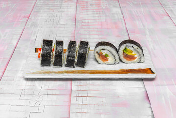 Making maki relies on the precise layering and rolling of a few fundamental elements