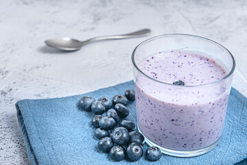 Blueberry and peanut butter smoothie, topped with crushed pretzels for a sweet and savory...