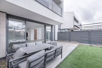 The key is to choose pieces that are not only aesthetically pleasing but also weather-resistant and comfortable.