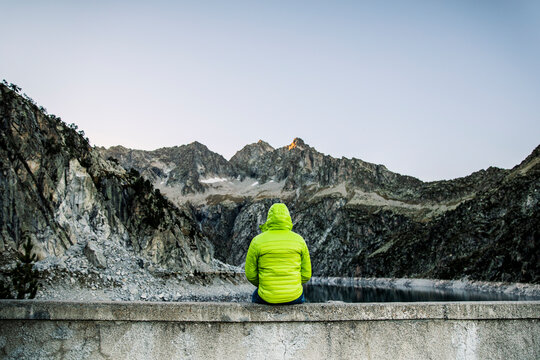 France, Hautes-Pyrenees, Massif du Neouvielle, back view of man looking at view