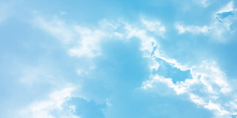 Storm clouds in the sky, Dramatic rain, Bright Flash shining light for design concept, panoramic view of clear blue sky and clouds, pastel white fluffy clouds