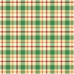 Colorful plaid seamless pattern for winter, festive Christmas.Tartan checkered gingham repeat pattern in green red beige yellow gold.Vector graphic texture for fabric and prints.
