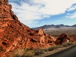 View over the Valley of Fire, Nevada, USA, with its Iconic red sandstone in the foreground and the...