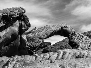 Dramatic vie in black and white of Arch rock, a natural rock arch in the Valley of Fire State Park...