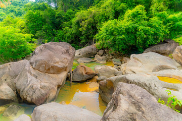 Mountain river.

Mountain lakes and rivers of the Baho Falls near Nha Trang in Vietnam. During the rainy season, this place turns into a deep river with large waterfalls. 
