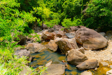 Mountain river.

Mountain lakes and rivers of the Baho Falls near Nha Trang in Vietnam. During the rainy season, this place turns into a deep river with large waterfalls. 
