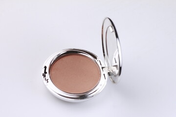 Makeup powder isolated on white background.