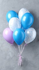 Colorful balloons in blue and purple ready for a celebration.