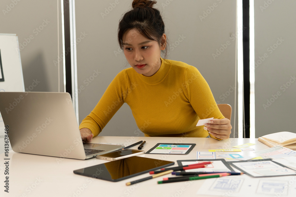 Wall mural creative web designer planning ui application and developing digital template