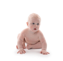 Cute little baby sitting on white background
