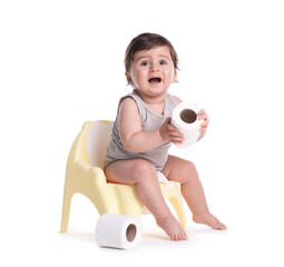 Cute little baby sitting on potty with toilet paper against white background