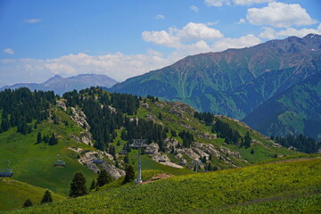 Cable car in the picturesque mountain gorge of Oi Karagai. Not far from Almaty. Mountainous area...