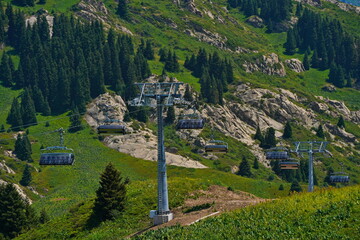 Cable car in the picturesque mountain gorge of Oi Karagai. Not far from Almaty. Mountainous area...