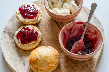 Traditional british scones with clotted cream and jam