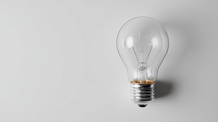 Clear light bulb on plain background