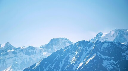 Obraz premium Scenery of the Blue Snow Mountain Range,panoramic view of the Alps—Towering Peaks in Azure Tones, Snow-Capped Summits & Vast Landscapes, Nature’s Breathtaking Alpine Canvas.