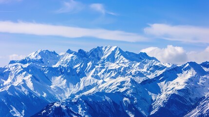 Obraz premium Scenery of the Blue Snow Mountain Range,panoramic view of the Alps—Towering Peaks in Azure Tones, Snow-Capped Summits & Vast Landscapes, Nature’s Breathtaking Alpine Canvas.