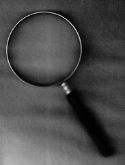 Magnifying Glass in Black and White for Investigation Concept