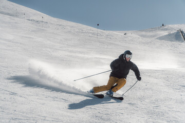 Person Skiing Down a Snowy Mountain in Chile