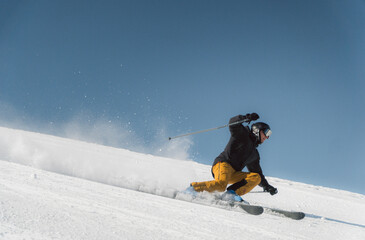 Skier on Snowy Mountain Slope in Chilean Andes