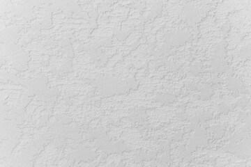 Obraz premium White textured plaster with shadow gradient for minimal background or material design concept